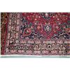 Image 2 : 100% handmade Iranian wool carpet "Mashad" with center medallion, red background and overall floral 