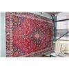 Image 1 : 100% handmade Iranian wool carpet "Mashad" with center medallion, red background and overall floral 