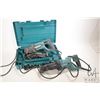 Image 1 : Two Makita power tools including a HR2475 hammer drill with case and two bits plus a JR3050T recipro