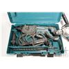Image 2 : Two Makita power tools including a HR2475 hammer drill with case and three bits plus a DS4012 heavy 
