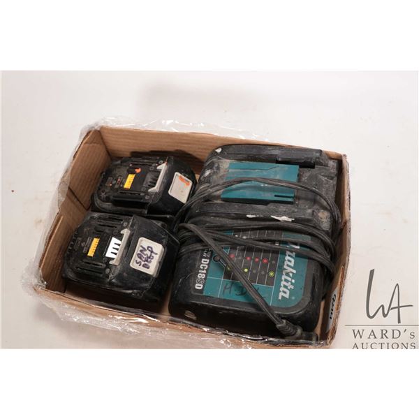 Two Mikita batteries 18v and charger
