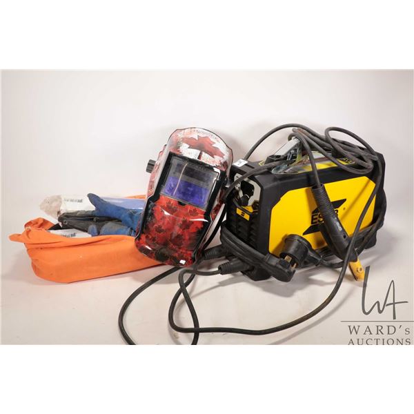 Rogue ES 1301 Pro welder with helmet, gloves and selection of welding rods, not tested