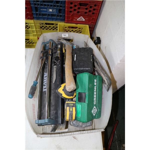 Assortment of tools including Greenlee manual knock out kit, tile cutter, tile hole cutters, trowels