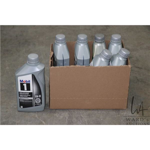 Seven 1 ltr. containers of Mobil 1 Advanced Full Synthetic SAE 10W-30 motor oil