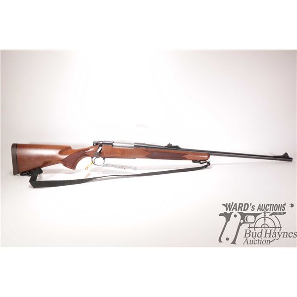 Non-Restricted rifle Remington model 700, .375 H&H Mag bolt action, w/ bbl length 24 1/2" [Blued bar