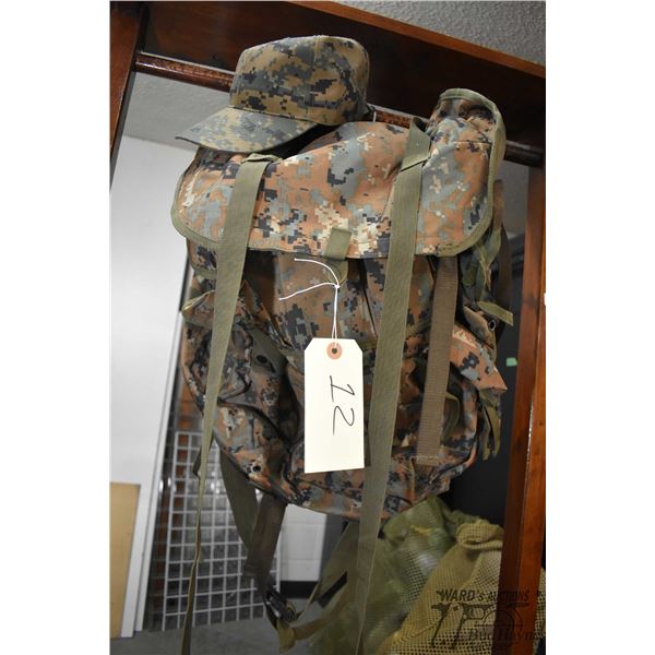 Metal frame camo backpack and camo XL pants Metal frame camo backpack and camo XL pants