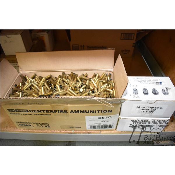 Box containing 21 lbs of .357 mag brass and two Box containing 21 lbs of .357 mag brass and two full
