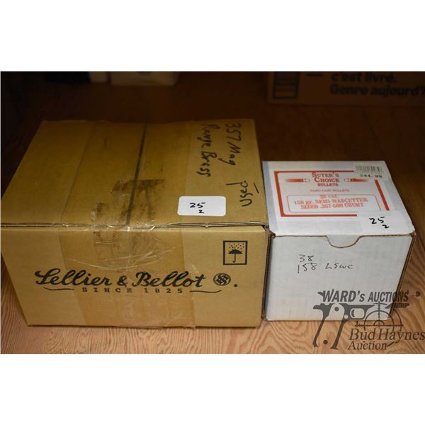 Box containing 9 lbs of .357 mag brass and a 500 Box containing 9 lbs of .357 mag brass and a 500 co