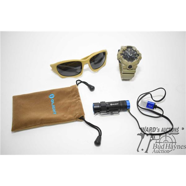 G-Shock 5522 watch, Olight w/ charge cord and case G-Shock 5522 watch, Olight w/ charge cord and cas