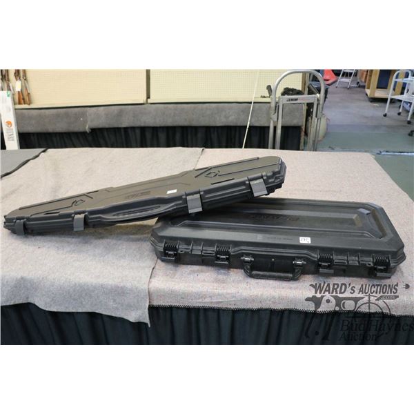 Plano adjustable foam lined 36  case and a Plano adjustable foam lined 36  case and a Pillarlock cas