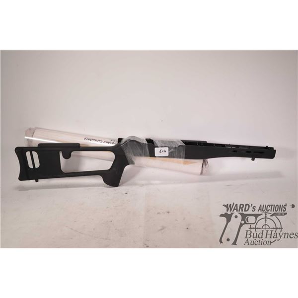 Ruger 10-22 stock and two Winchester calendars Ruger 10-22 stock and two Winchester calendars (1977 