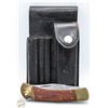 Image 1 : FOLDING KNIVE IN GENUINE LEATHER SHEATH