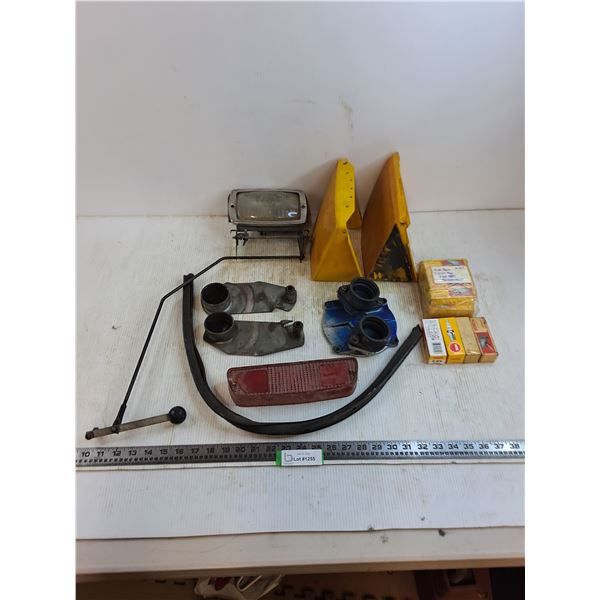 Snowmobile Parts (Spark Plugs, Housing, Headlight, Manifolds, Seal Strip)