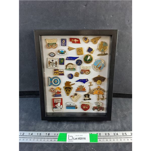 Various Shirt Pins in a Display Case