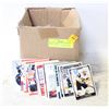 Image 1 : BOX OF UNCOUNTED UNSORTED SPORTS CARDS