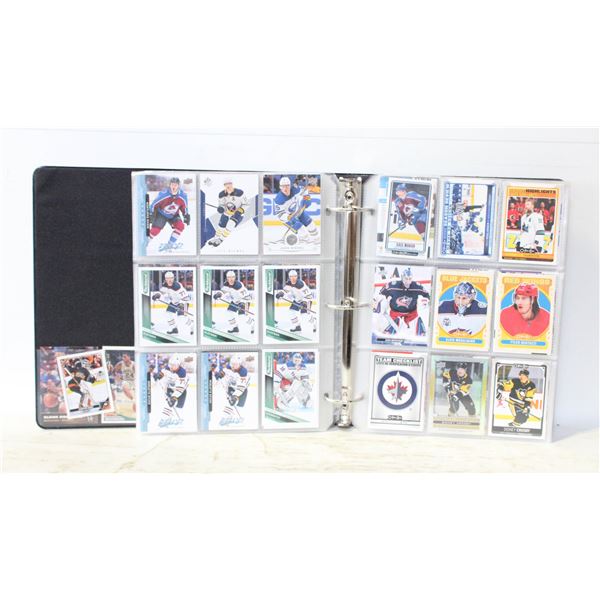 2 INCH THICK BINDER FILLED WITH SHEETS OF