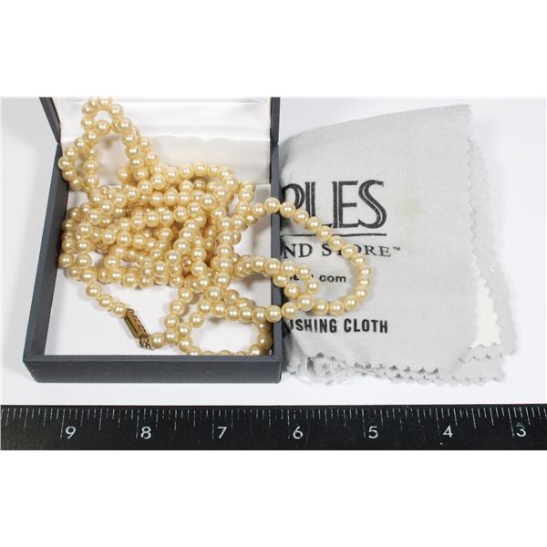 FAUX PEARL NECKLACE SOLD WITH PEOPLES