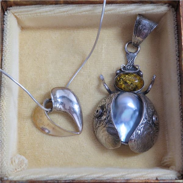 925 Silver chain w/ two pendants.  Heart marked 925 and a unique bug marked 925 "Milana 2000"