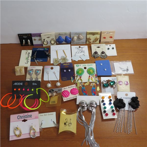 New Earring lot.  31 packages of new in package pierced earrings
