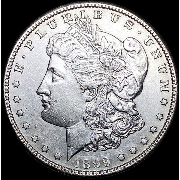1899 Silver Morgan Dollar ABOUT UNCIRCULATED