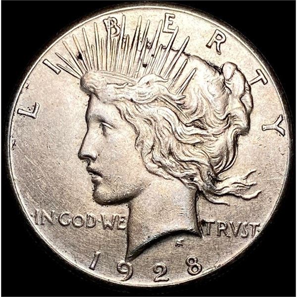 1928 Silver Peace Dollar NEARLY UNCIRCULATED