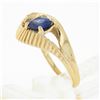 Image 8 : 14k Gold 0.80 ctw Oval Sapphire Solitaire Polished Grooved Open Loop Bypass Ring