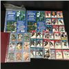 Image 1 : LOT OF VINTAGE SPORTS CARDS AND PLASTIC SHEETS