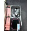 Image 2 : Smart Watch With Pink Band, Charging Cable, And Accessories