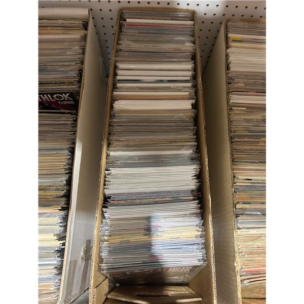Comic Book Collection Featuring Various Titles and Issues