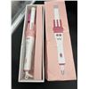 Image 1 : Pink and White Hair Curling Iron with Adjustable Heat Settings