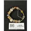 Image 1 : Gold Plated Marked Pandora Charm Bracelet