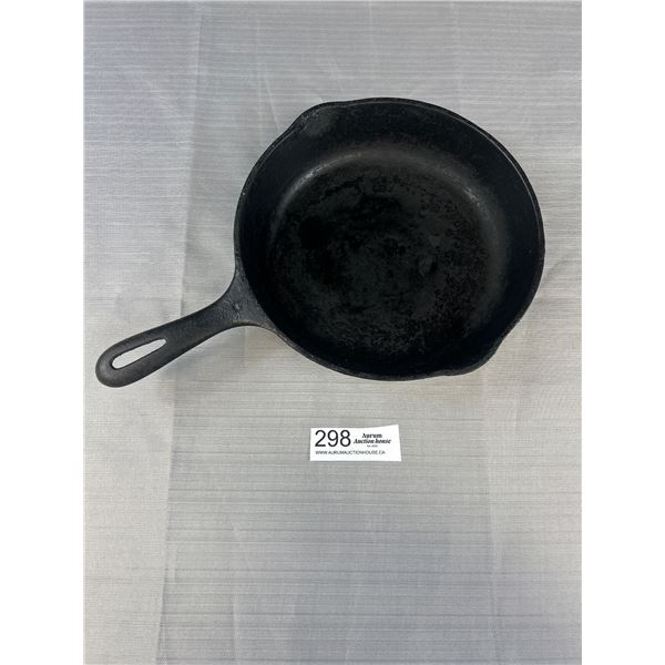 A Vintager Wagner Ware 9 inch Cast Iron Skillet