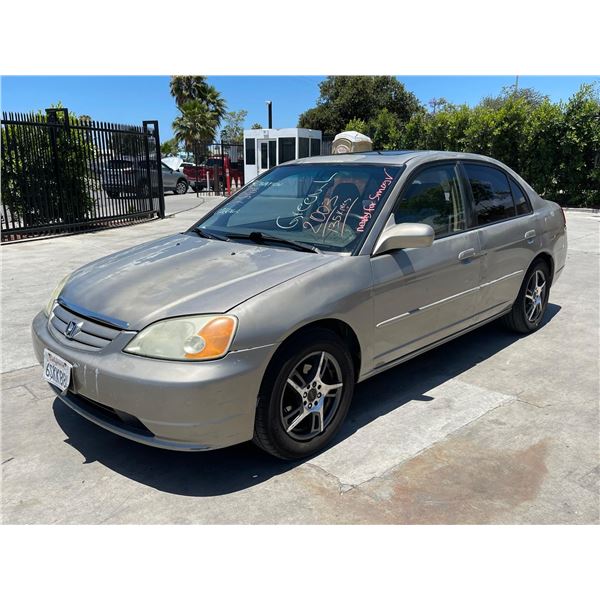 HOND CIVIC 2003 T-DONATION