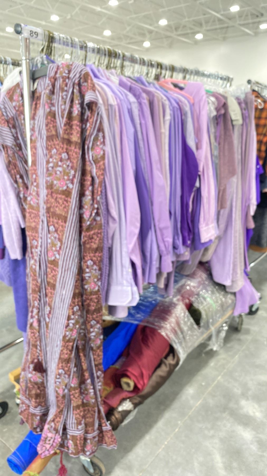 RACK OF ASSORTED WARDROBE CLOTHING *RACK INCLUDED & MUST BE TAKEN ...
