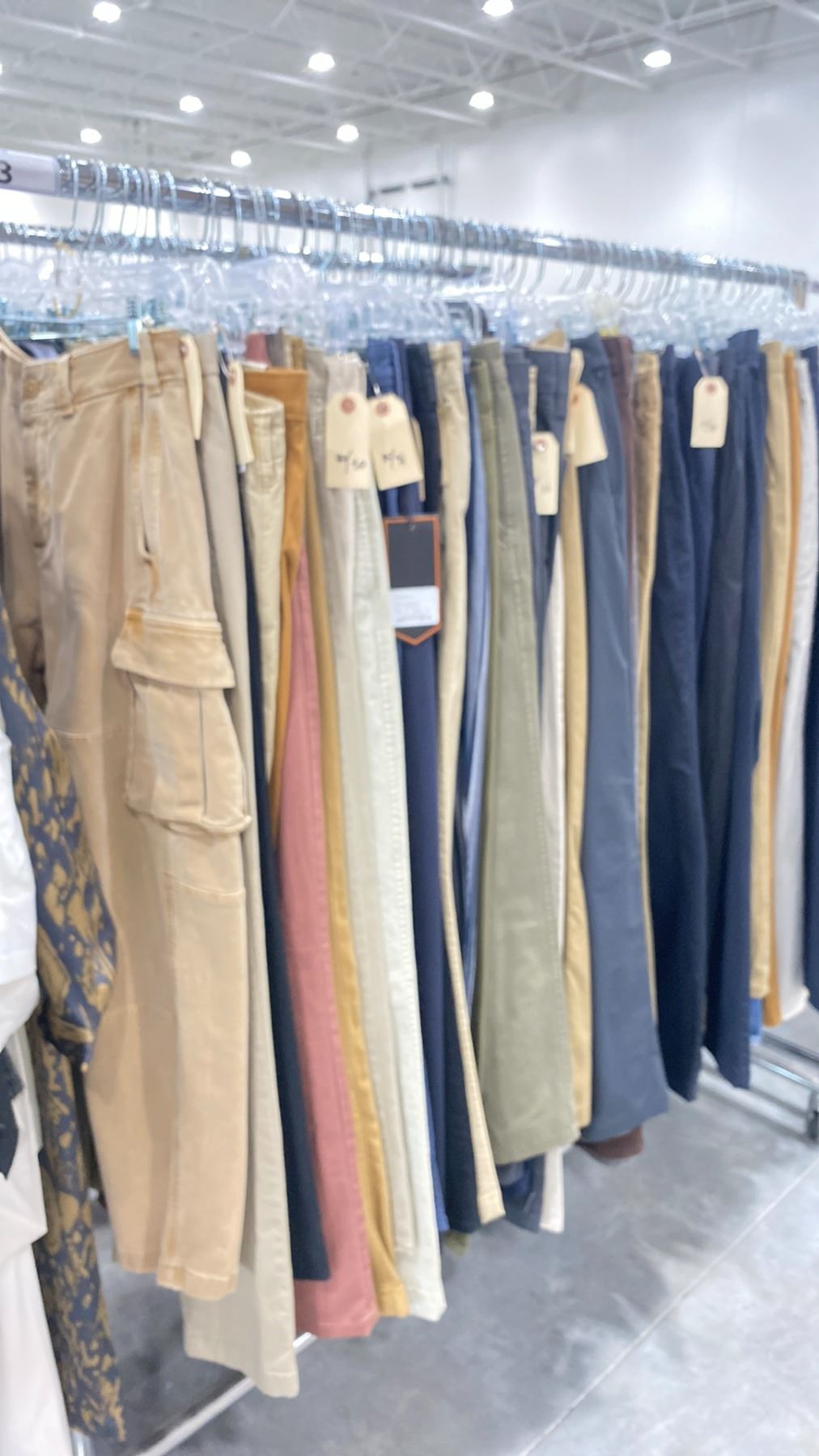 RACK OF ASSORTED WARDROBE CLOTHING *RACK INCLUDED & MUST BE TAKEN ...