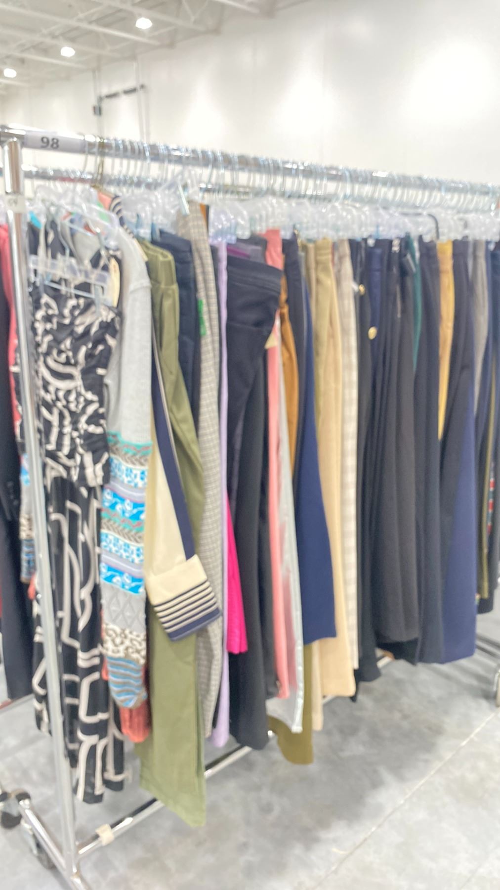 RACK OF ASSORTED WARDROBE CLOTHING *RACK INCLUDED & MUST BE TAKEN ...