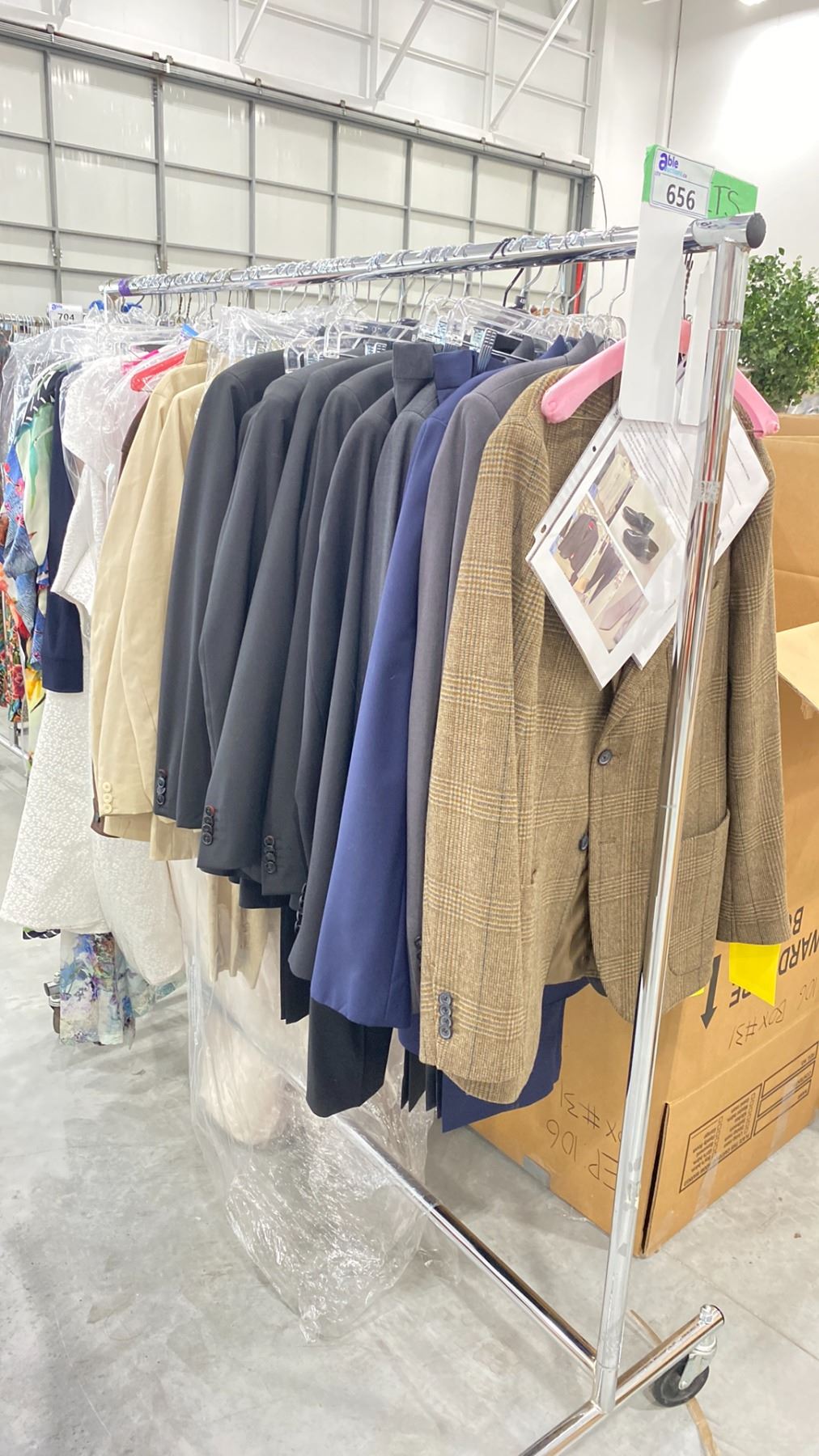 RACK OF ASSORTED WARDROBE CLOTHING (RACK INCLUDED & MUST BE TAKEN ...