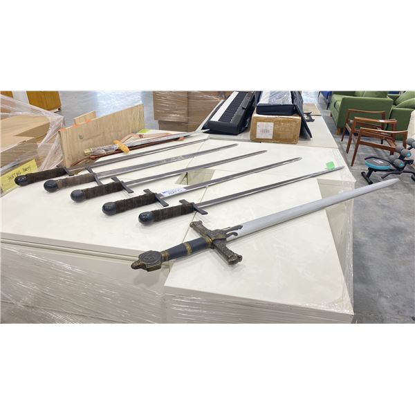 (5 )METAL PROP SWORDS, (1) RUBBER PROP SWORD AND ONE REAL SHORT SWORD WITH SHEATH
