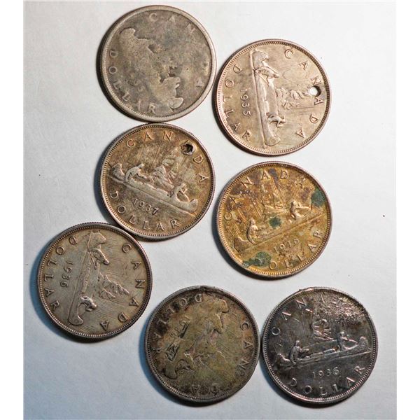 1935 $1 (2), 1936 (3), 1937, and 1946, cull and better, lot of 7 coins.