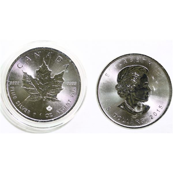 SML; 2015 Silver Maple Leaf pure silver .9999.  Tax exempt