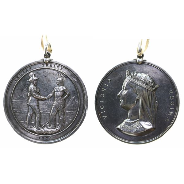 Indian Treaty No. 7 Silver Medal, issued in 1877. This is an extremely scarce and historically impor