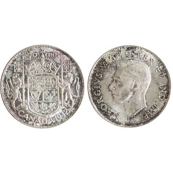 1942 50¢  ICCS Gem Mint State-65, Light gold and russet tones over full underlying lustre.