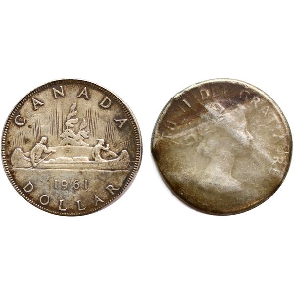 Error; Dramatic Planchet error; 1961 Silver Dollar EF or better.  A pretty cool and unusual error!  