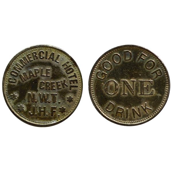 Br# 931 - North West Territories, J.H. Flemming, white metal.  Very scarce.