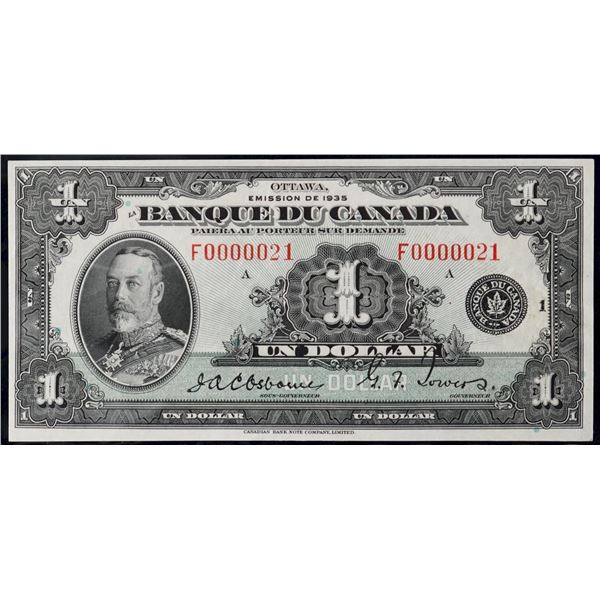 Low Number; 1935 $1 BC-2-N5-i-iii #F000021, CCGS Choice Extra Fine-45. Bright attractive example.