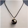 Image 1 : 14K Gold Pendant with Raised Star Motif on Onyx Orb Necklace
