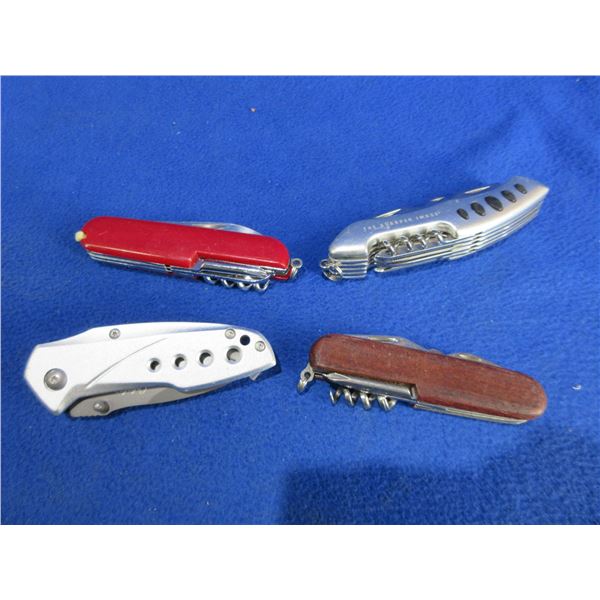 4 Folding Blade Pocket Knives - 3 are Swiss Style, 1 is Lock Blade