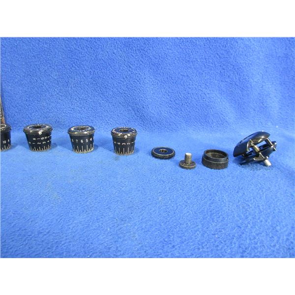 4 Turret Caps (Appear to be Leupold), Misc. Scope Parts & a Trigger Lock