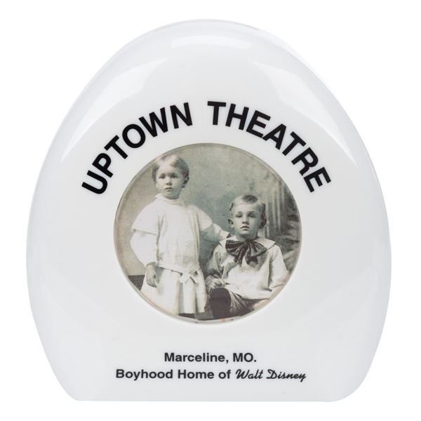 A Walt Disney's Hometown Uptown Theater Coin Bank.