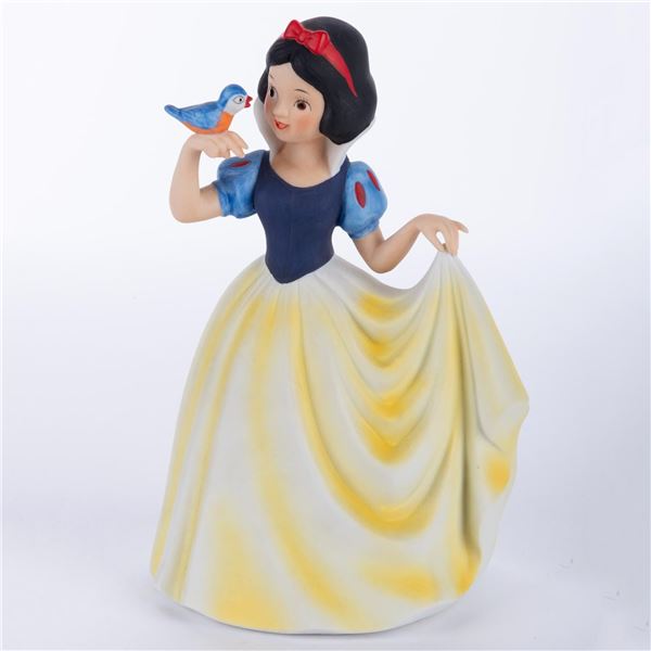 A Snow White Musical Bisque Figurine.
